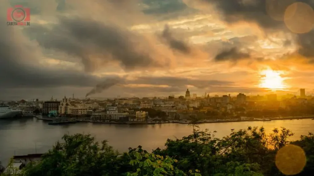 Havana-old-town-at-river-with-dark-clouds-at-sunset-lens-flare-cameradealsonline
